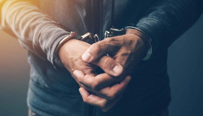 hands in handcuffs