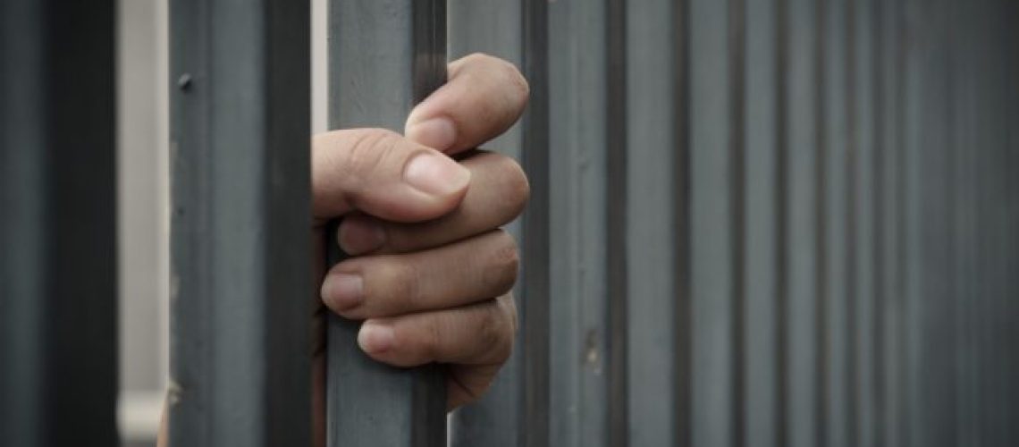 Behind bars waiting for bail bond
