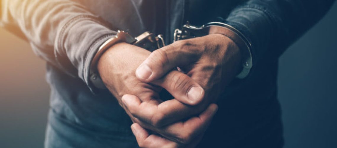 hands in handcuffs